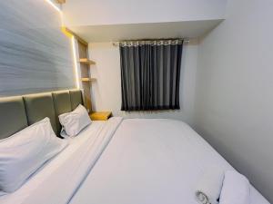 Compact and Relaxing 2BR at Suncity Residence Apartment By Travelio