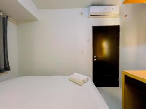 Compact and Relaxing 2BR at Suncity Residence Apartment By Travelio