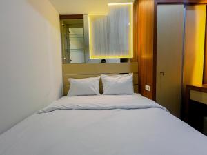 Compact and Relaxing 2BR at Suncity Residence Apartment By Travelio