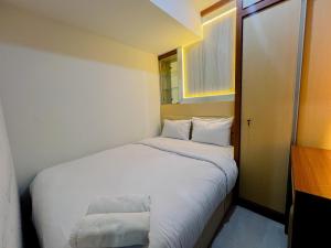 Compact and Relaxing 2BR at Suncity Residence Apartment By Travelio