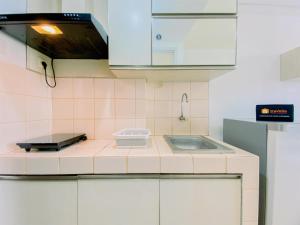Modern and Good Deal Studio at Serpong Greenview Apartment By Travelio