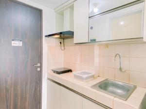 Modern and Good Deal Studio at Serpong Greenview Apartment By Travelio