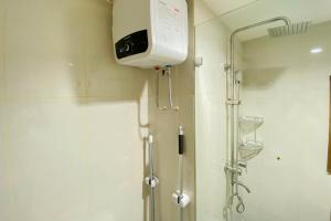 Homey and Nice 1BR at Gateway Park LRT City Bekasi Apartment By Travelio