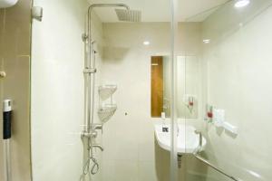 Homey and Nice 1BR at Gateway Park LRT City Bekasi Apartment By Travelio