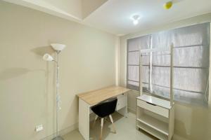 Homey and Nice 1BR at Gateway Park LRT City Bekasi Apartment By Travelio