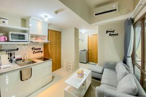Homey and Nice 1BR at Gateway Park LRT City Bekasi Apartment By Travelio