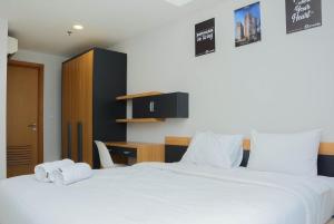 Best Modern 1BR Apartment The Mansion Kemayoran By Travelio