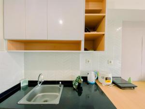 Restful and Minimalist Studio Springlake Summarecon Bekasi Apartment By Travelio