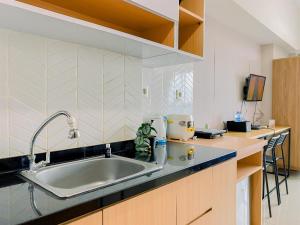 Restful and Minimalist Studio Springlake Summarecon Bekasi Apartment By Travelio