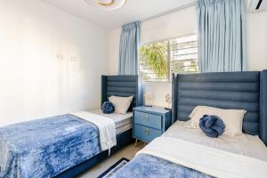 Chic Urban Retreat with Pool, Gym, & Free Parking