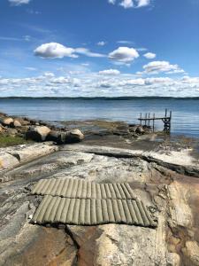 Modern Cottage With Basketball Court On Tjörn