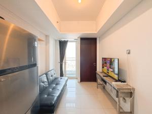 Good Location and Serene 2BR at Linden Apartment By Travelio