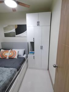 Yammys HomeyStyle Condo at Tower 3 Shore 3 Residences