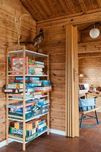 A Small Wooden Hut In A Large Community
