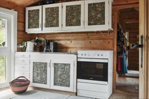 Rustic Cosiness In Norwegian Log Cabin With View