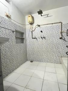 Nest - Quad Room Alopibagh