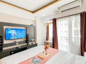 Best Deal and Homey Studio Grand Sentraland Karawang Apartment By Travelio