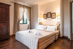 Villas Les anciennes ecuries, belle villa pour 12 personnes au coeur d-un vignoble avec piscine : photos des chambres