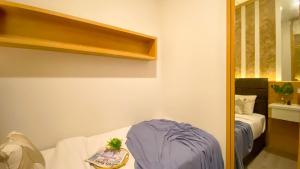 Nice and Restful 2BR at Sudirman Suites Apartment By Travelio