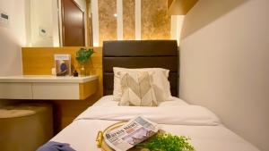 Nice and Restful 2BR at Sudirman Suites Apartment By Travelio