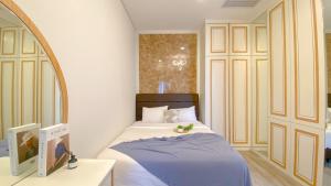 Nice and Restful 2BR at Sudirman Suites Apartment By Travelio