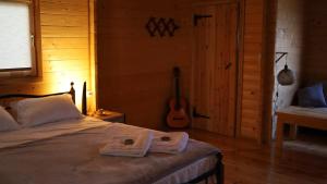 Petrakis Aris Beach Apartments Log Cabin No1