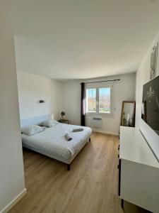 Appartements Maison du Cos entierement renovee avec 3 chambres : photos des chambres