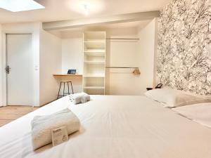 Appartements Le Triangle d-Or - Elegance & Confort - Central : photos des chambres