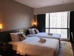 The Metro Zen at Hotel Residences Acqua - Novotel Tower