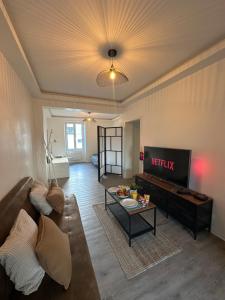 Appartements # Le 13 # Nouveau T3 renove au calme vue sur les Vosges : photos des chambres