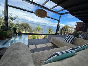 Preciosa casa frente al mar