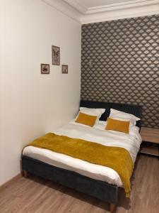 Appartements studio avec terrasse en face la gare d’Enghien a 15 minute de paris gare du nord et a 10 mn de stade de France : photos des chambres