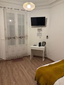 Appartements studio avec terrasse en face la gare d’Enghien a 15 minute de paris gare du nord et a 10 mn de stade de France : photos des chambres