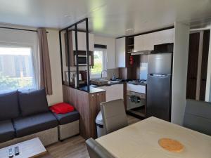 Campings Mobilehome familial : photos des chambres