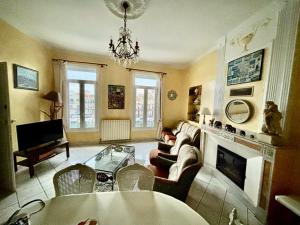 Appartements appartquaisete et garage : photos des chambres