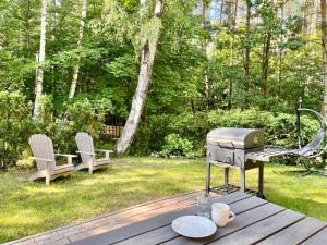 Mazursko - komfortowe apartamenty nad jeziorem, sauna, kominki na parterze