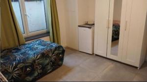 Chambre 2lit célibataire schaarbeek sous-sol