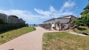 CAMERA SUL MARE con OMBRELLONE