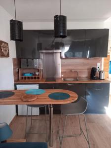 Appartements Lac et commerces a pieds : photos des chambres