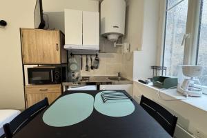 Appartements Charming studio in the city center : photos des chambres