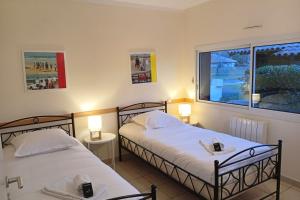 Maisons de vacances Villa 145 m near ocean with pool and garden : photos des chambres