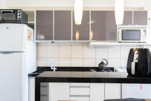 Apartamento a 400M PRAIA com PISCINA sacada com CHURRASQUEIRA privativa Wi-Fi Portaria 24h PLAYGROUND INFANTIL Quadra de esportes e vaga privativa de GARAGEM Reserve agora mesmo