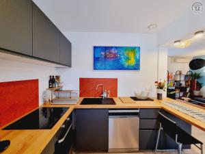 Maisons de vacances Gite independant avec jardin prive, Wi-Fi et climatisation a proximite de Lille - FR-1-510-230 : photos des chambres