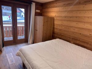 Appartements Appartement cozy 3P a 5m du front de neige avec parking et terrasse - FR-1-464-236 : photos des chambres
