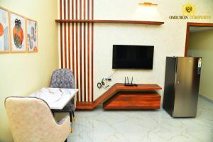 Omicron Comforts 1BHK 2BHK Service Apartment
