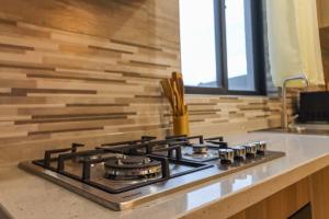 2 BR Condo with a balcony, pool&gym