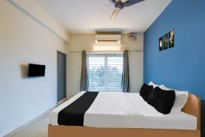 Hotel O ECR Stays Near Nemmeli Beach Formerly GVS Homes