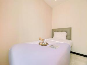 Good Place 2BR Apartment Bellagio Residence By Travelio