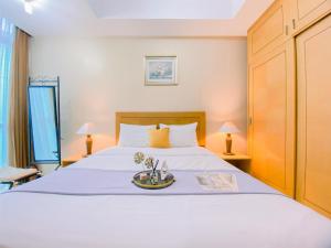 Good Place 2BR Apartment Bellagio Residence By Travelio