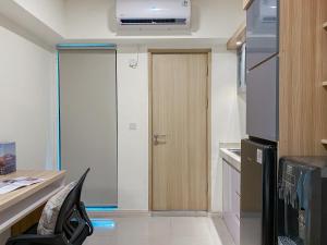 Good Place and Homey Studio Meikarta Apartment By Travelio